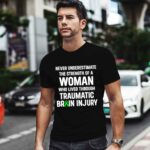 Never Underestimate The Strength Of Woman Who Lived Through Traumatic Brain Injury Survivor TBI Warrior 0 T Shirt